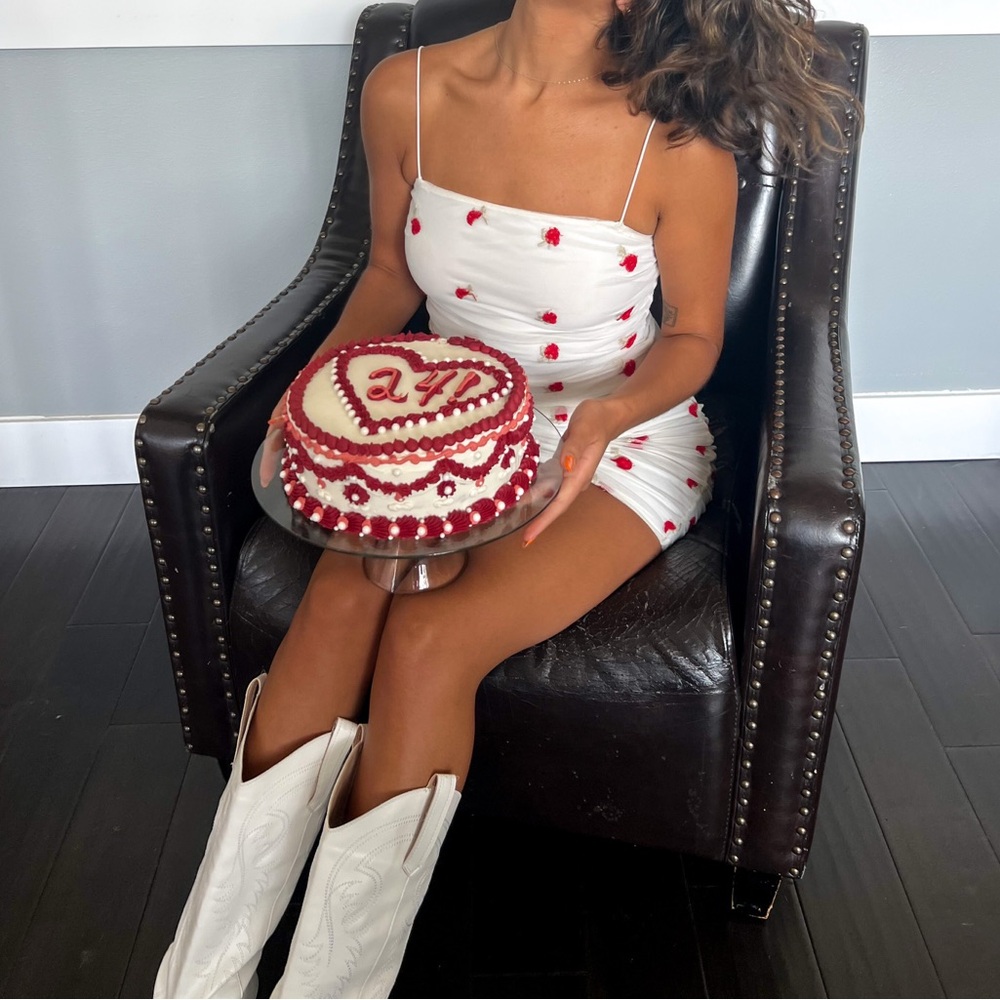 Rouched white mini dress with red flowers